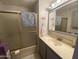 Bathroom featuring a shower, vanity with countertop, and modern fixtures at 1004 S Kiowa Cir, Apache Junction, AZ 85119