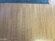 Image of light brown laminate flooring in a home at 1004 S Kiowa Cir, Apache Junction, AZ 85119