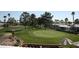 Well-maintained golf course showcasing meticulously manicured greens, perfect for leisure and recreation at 1004 S Kiowa Cir, Apache Junction, AZ 85119
