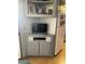 View of a gray kitchen cabinet in the corner of a manufactured home at 1004 S Kiowa Cir, Apache Junction, AZ 85119