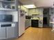 The kitchen boasts gray cabinetry and appliances at 1004 S Kiowa Cir, Apache Junction, AZ 85119