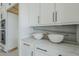 Modern kitchen features white cabinets, stainless appliances, and gray countertop at 11045 N Hershey St, Surprise, AZ 85388