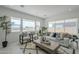 Bright living room with modern furniture and view of backyard at 11045 N Hershey St, Surprise, AZ 85388