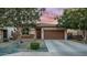 Charming single-story home with a two-car garage, desert landscaping and cozy curb appeal at 11742 W Chase Ln, Avondale, AZ 85323