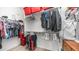 Spacious walk-in closet with ample shelving and storage for clothing, shoes, and accessories in the Primary suite at 11742 W Chase Ln, Avondale, AZ 85323