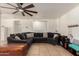 The living room features an open floor plan with tiled floors at 12606 W Scotts Dr, El Mirage, AZ 85335