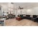 The living room features an open floor plan with tiled floors at 12606 W Scotts Dr, El Mirage, AZ 85335