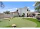 Stunning backyard with a private putting green and mature trees at 13250 N 13Th Ln, Phoenix, AZ 85029