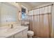 Bathroom vanity with chrome faucet, and a shower and bath combination at 13250 N 13Th Ln, Phoenix, AZ 85029
