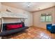 Bedroom features a bunk bed and tiled floor at 13250 N 13Th Ln, Phoenix, AZ 85029