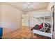 Bedroom features a bunk bed and tiled floor at 13250 N 13Th Ln, Phoenix, AZ 85029