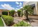 Relaxing courtyard featuring a water fountain, gravel landscape, and a desert plants at 13250 N 13Th Ln, Phoenix, AZ 85029
