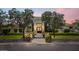 Stunning home showcasing mature trees, manicured landscaping, and a stone pathway leading to the front entrance at 13250 N 13Th Ln, Phoenix, AZ 85029