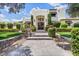 Charming home with meticulously manicured front yard, stone walkway and retaining wall, and classic architecture at 13250 N 13Th Ln, Phoenix, AZ 85029