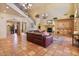 Charming living room showcasing tile floors, a fireplace, and a seamless transition to outdoor spaces at 13250 N 13Th Ln, Phoenix, AZ 85029