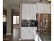 Bright kitchen featuring white cabinets, stainless steel appliances and granite countertops at 13486 W Evans Dr, Surprise, AZ 85379