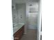 Neutral bathroom featuring a white vanity top, tub, shower, and hardware at 14150 W Boca Raton Rd, Surprise, AZ 85379
