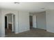 Main bedroom featuring a walk-in closet and an ensuite bathroom, providing a private retreat at 14150 W Boca Raton Rd, Surprise, AZ 85379