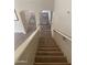 Carpeted staircase leading to the upper level, providing access to the home's bedrooms at 14150 W Boca Raton Rd, Surprise, AZ 85379