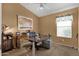 Home office featuring a desk, office chair, decor and natural light from a window at 1558 W Maplewood St, Chandler, AZ 85286