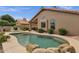 Serene backyard pool area with lush landscaping and comfortable seating, creating a tranquil outdoor oasis at 1558 W Maplewood St, Chandler, AZ 85286