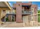 Cozy two-story condo features balconies, a private walkway, and xeriscaping with desert plants at 16602 N 25Th St # 204, Phoenix, AZ 85032