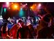 Energetic live concert featuring a diverse band and enthusiastic crowd in a vibrant atmosphere at 17111 S 180Th Ln, Goodyear, AZ 85338