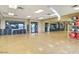 Spacious, well-lit exercise room with hardwood floors and fitness equipment, perfect for group classes at 17111 S 180Th Ln, Goodyear, AZ 85338