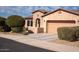 Beautiful single-Gathering home featuring a well-maintained exterior, neutral stucco, and a two-car garage at 17111 S 180Th Ln, Goodyear, AZ 85338
