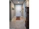 Welcoming foyer with a decorative rug and a classic grandfather clock at 17111 S 180Th Ln, Goodyear, AZ 85338