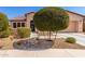 Charming single-Gathering home with manicured landscaping, decorative rock, and inviting curb appeal at 17111 S 180Th Ln, Goodyear, AZ 85338