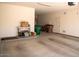 Clean and organized garage with storage solutions and plenty of open space at 17111 S 180Th Ln, Goodyear, AZ 85338