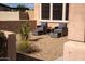 Cozy patio space with stylish seating area, perfect for outdoor relaxation and entertaining at 17111 S 180Th Ln, Goodyear, AZ 85338