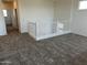 Upstairs hallway with a railing overlooking another area, bright and airy at 17245 W Corrine Dr, Surprise, AZ 85388