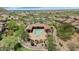 Aerial view showcasing community center with swimming pool and meticulously kept landscaping at 1847 N Red Clf, Mesa, AZ 85207