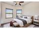 Comfortable bedroom featuring a stylish bed, neutral decor, and bright natural light at 1847 N Red Clf, Mesa, AZ 85207
