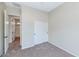 Cozy bedroom featuring carpeted floors and access to the ensuite bathroom at 1847 N Red Clf, Mesa, AZ 85207