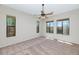 Bright primary bedroom with multiple windows and neutral carpet at 1847 N Red Clf, Mesa, AZ 85207