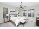 Stylish bedroom with a ceiling fan, natural lighting and a beautiful view of the outdoors at 1847 N Red Clf, Mesa, AZ 85207
