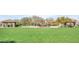 Enjoy the community playground, with mature shade trees and a covered picnic area, all on a lush green lawn at 1847 N Red Clf, Mesa, AZ 85207