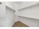 Neat and spacious walk-in closet with ample shelving for storage at 1847 N Red Clf, Mesa, AZ 85207