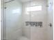This gorgeous glass shower stall features decorative accent tiles and shower niche with plenty of room at 1850 E Creek Canyon Rd, Phoenix, AZ 85086
