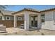 Cozy covered patio with a table and chairs, perfect for outdoor dining and relaxation at 23081 E Saddle Way, Queen Creek, AZ 85142