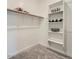 Spacious walk-in closet with custom shelving and ample storage space at 23081 E Saddle Way, Queen Creek, AZ 85142