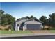 Charming single-story home with a two-car garage and a beautifully landscaped front yard at 23213 W Marguerite Ave, Buckeye, AZ 85326