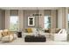 Cozy living room with stylish decor, comfortable seating, and an elegant chandelier at 23213 W Marguerite Ave, Buckeye, AZ 85326