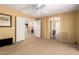 Expansive main bedroom with natural light, carpet, and access to ensuite bathroom at 2526 W Florentine Rd, Phoenix, AZ 85086