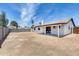 Large backyard with a covered patio and a white home at 3011 E John Cabot Dr, Phoenix, AZ 85032