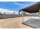 Spacious backyard with a covered patio and block fence for privacy at 3011 E John Cabot Dr, Phoenix, AZ 85032