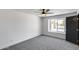 Bright bedroom boasts a window and black door at 3011 E John Cabot Dr, Phoenix, AZ 85032